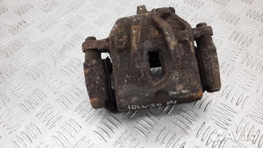 Суппорт тормозной передний левый KIA carens 2 (10V