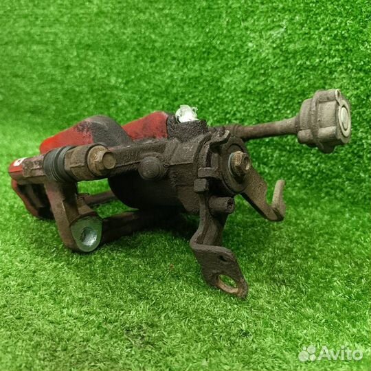 Суппорт тормозной задний правый Opel Astra J GTC