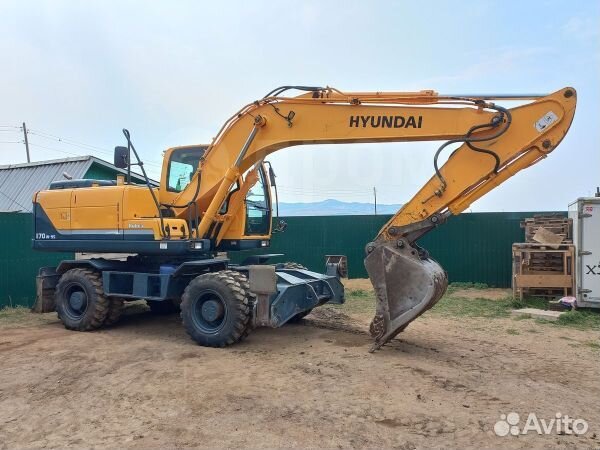 Колёсный полноповоротный экскаватор ковш 1м3