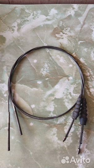Трос ручного тормоза новый