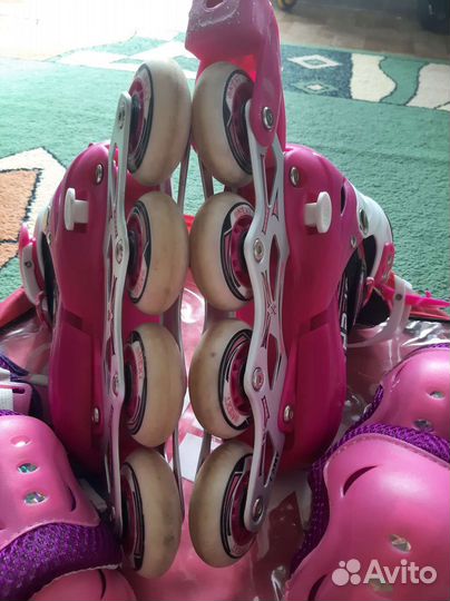 Роликовые коньки