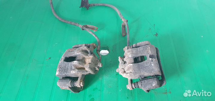 Суппорт тормозной передний правый левый Kia Rio 3