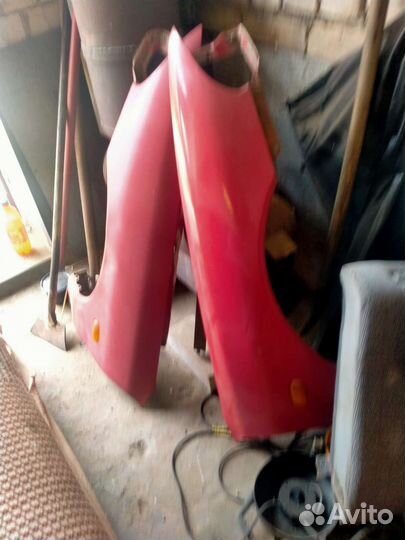 Крылья передние Mitsubishi Lancer 6