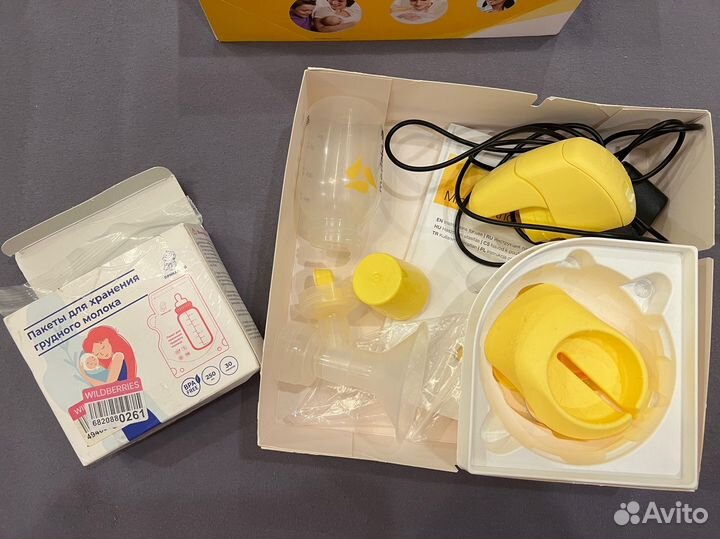 Молокоотсос medela