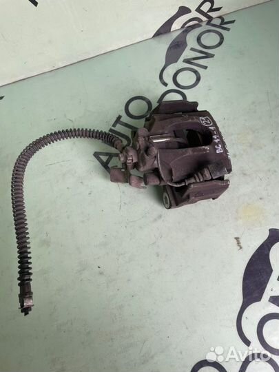 Суппорт задний правый Volkswagen Touareg 7L