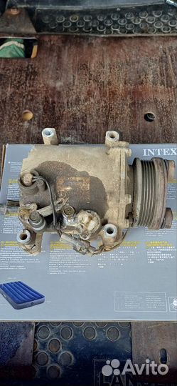 Компрессор кондиционера на mitsubishi lancer 9