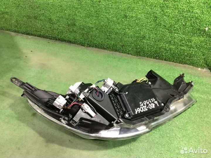 Фара ксеноновая левая Subaru Outback BR9 EJ253