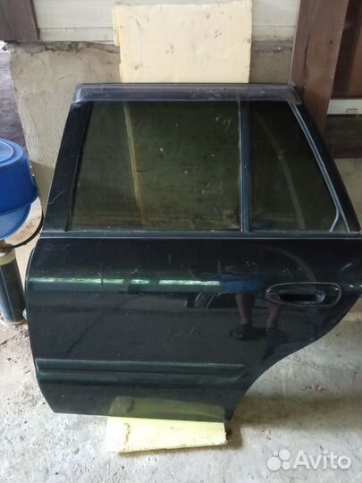 Двери Mazda Capella wagon