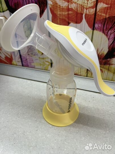 Молокоотсос medela ручной