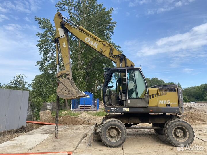 Колёсный экскаватор O&K MH 5 Сompact, 2003