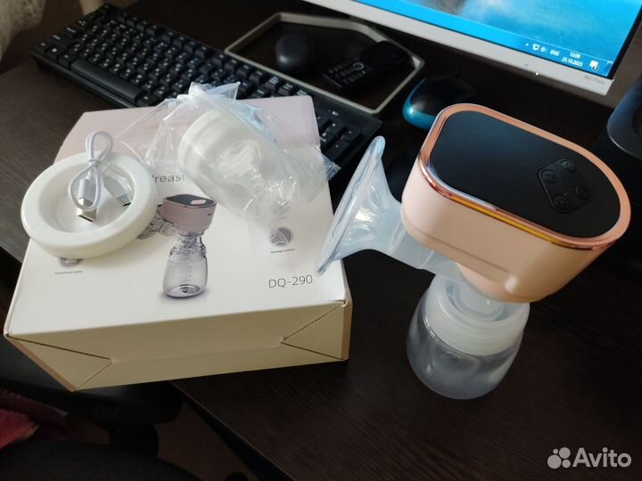 Молокоотсос электрический новый