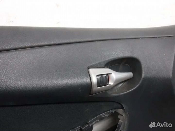 Обшивка двери передняя левая Toyota Corolla 151