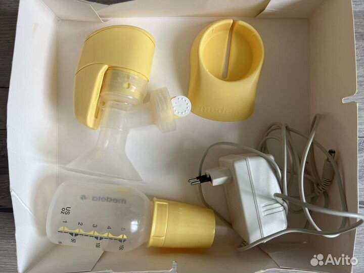 Молокоотсос medela электрический