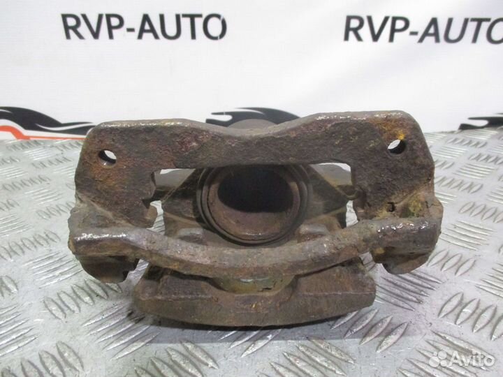 Суппорт тормозной передний Mazda 626 GF 1997-2002