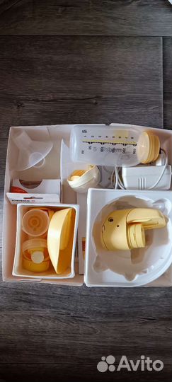 Молокоотсос medela mini электрический