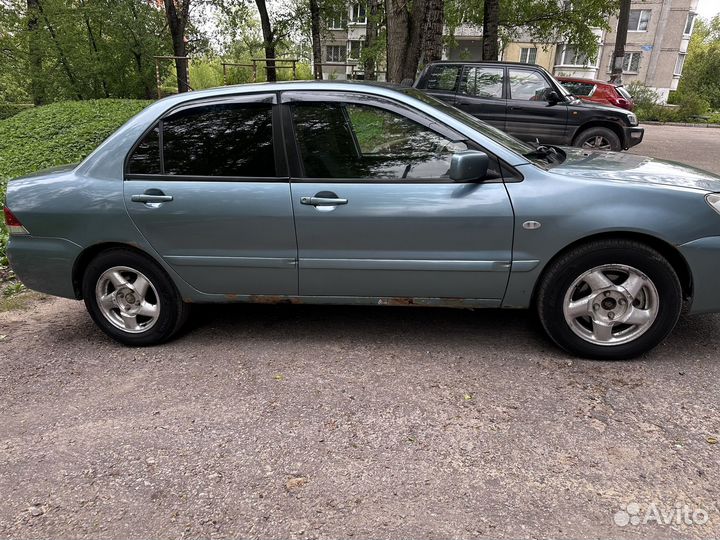 Mitsubishi Lancer 1.6 МТ, 2006, 245 000 км