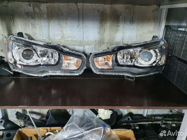 Фары перед Bi-Xenon оригинал mitsubishi lancer 10