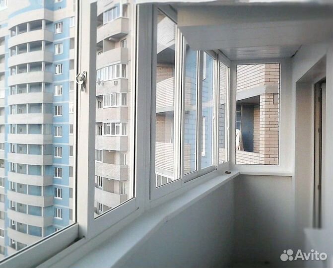 Остекление балкона раздвижными алюминиевыми окнами