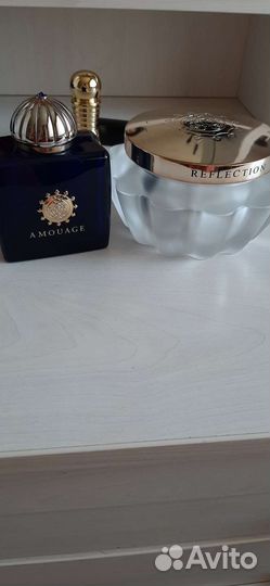 Пустые флакон из под парфюма и банка из под крема