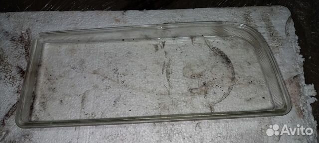 Стекло фары левой