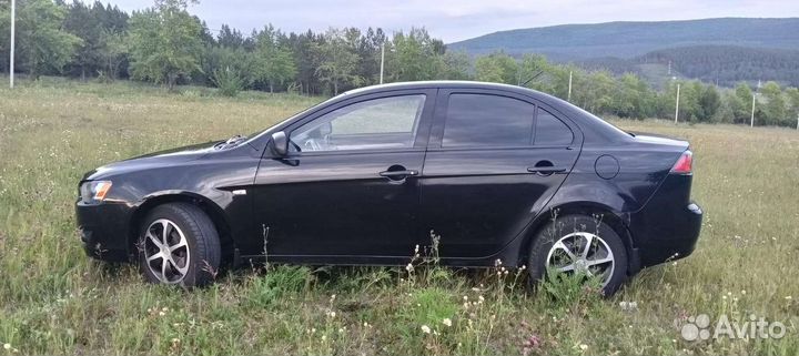 Mitsubishi Lancer 1.5 МТ, 2010, 197 000 км