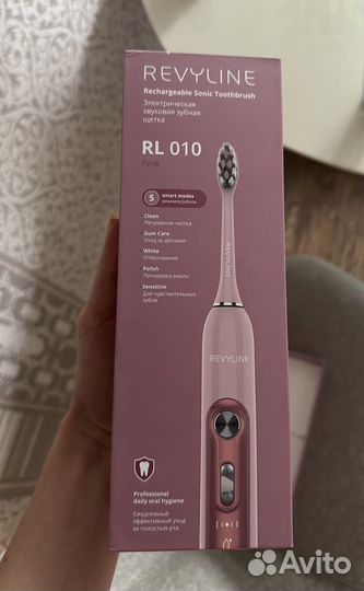 Электрическая зубная щетка