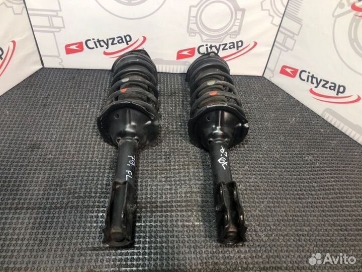 Стойка подвески передняя левая Toyota Raum NCZ25