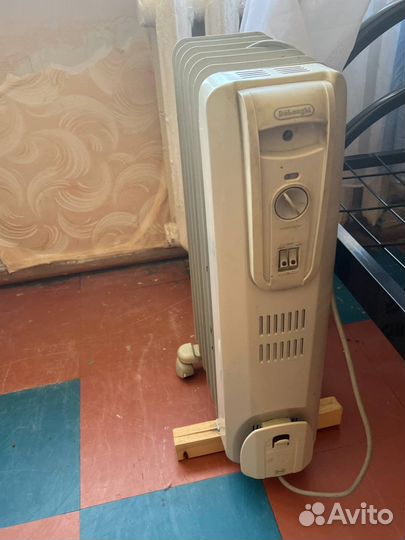 Масляный обогреватель delonghi