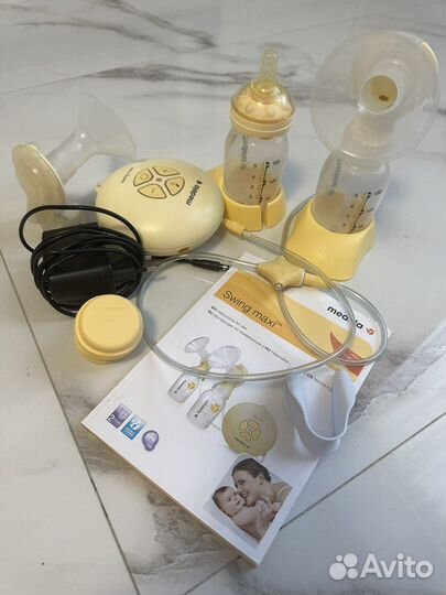 Молокоотсос medela электрический