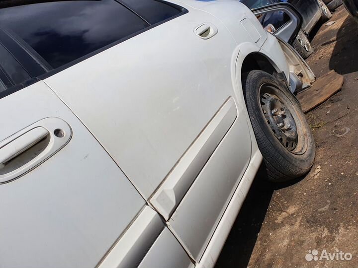 Дверь задняя левая Nissan Almera Classic алмера