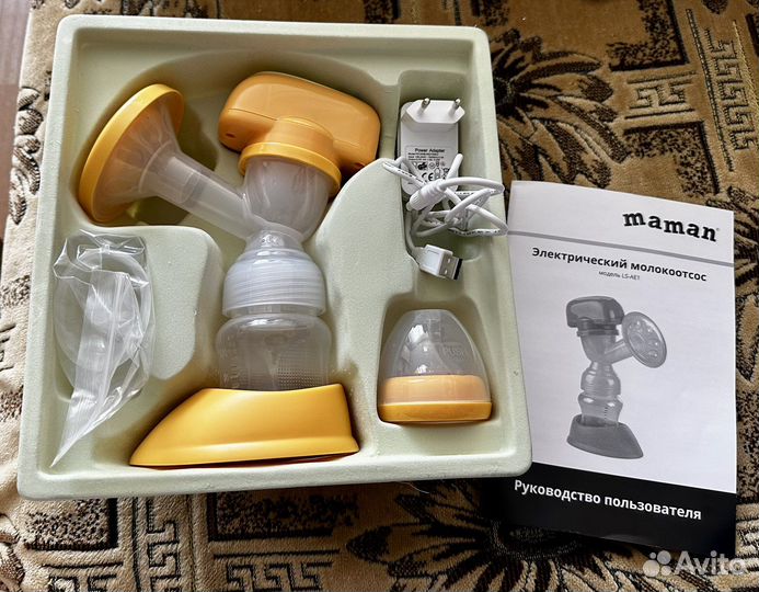Молокоотсос электрический новый