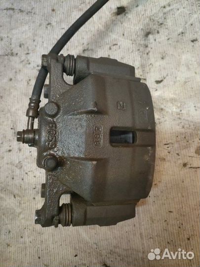 Суппорт тормозной передний правый Nissan X-Trail