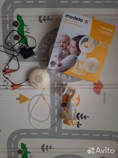 Молокоотсос medela swing flex электрический