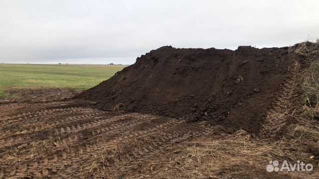 Чернозем для сада в мешках и валом