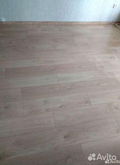 Укладка кварцвиниловой плитки и ламината