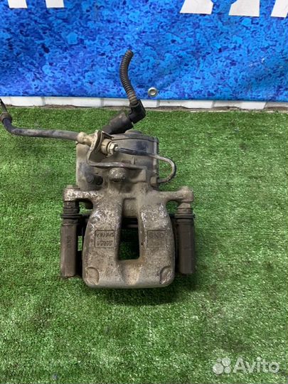 Суппорт тормозной задний правый Volkswagen Passat