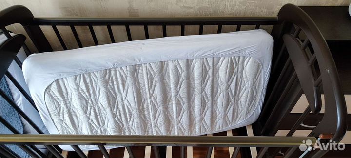 Детская кроватка с поперечным маятником