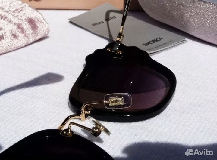 Солнцезащитные очки Miu Miu от Prada