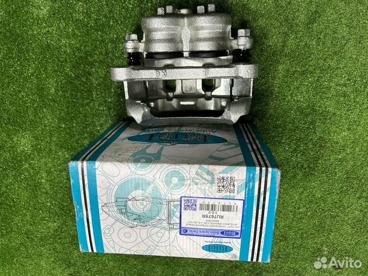 Суппорт тормозной левый Mitsubishi Grandis NA 4G69