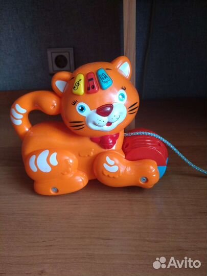 Игрушка-каталка музыкальная