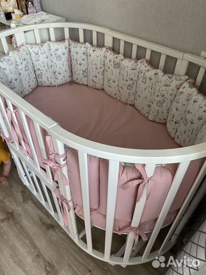 Детская кроватка с маятником круглая