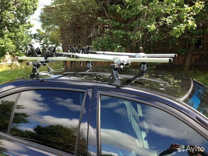 Велокрепление Amos на крышу Skoda Octavia