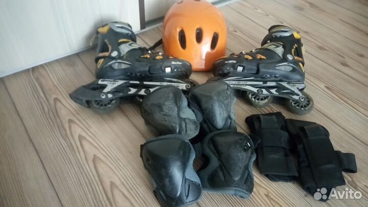 Роликовые коньки