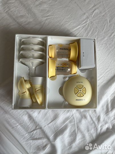 Молокоотсос medela swing maxi flex