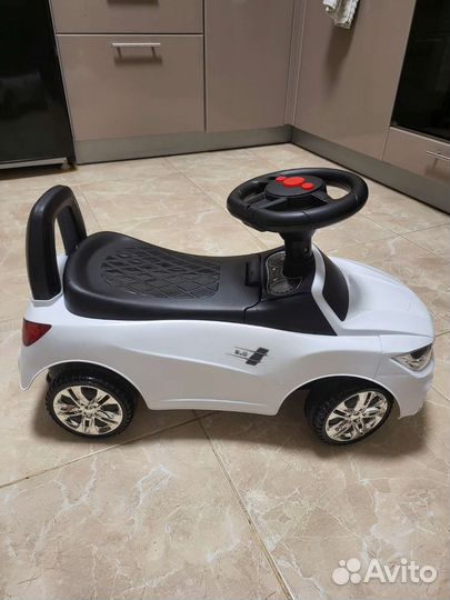 Машинка каталка толокар