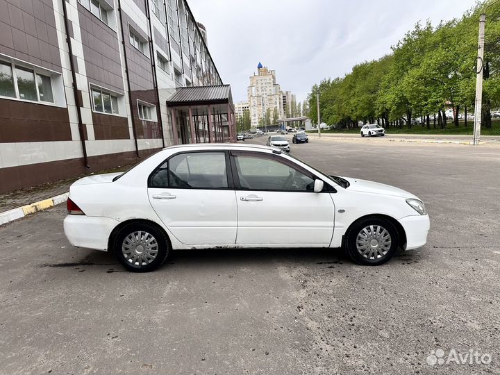 Mitsubishi Lancer 1.5 CVT, 2004, 154 230 км