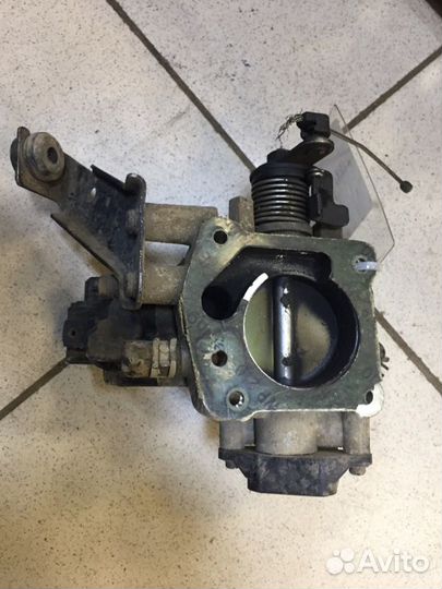 Дросельная заслонка Kia Spectra S6D