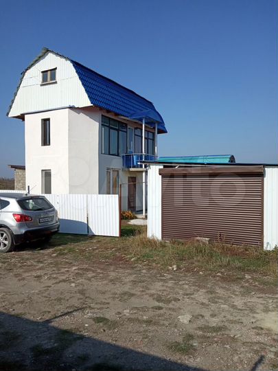 Дом 100 м² на участке 5 сот.