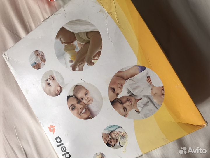 Молокоотсос medela электрический