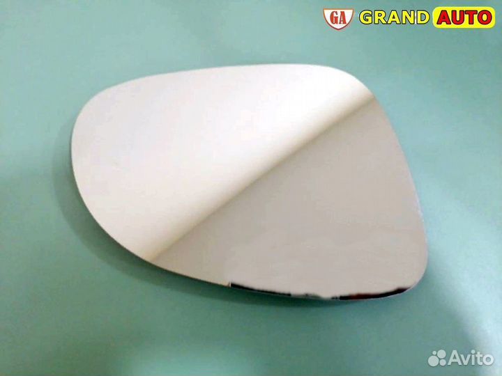 Стекло бокового зеркала правого VW Passat B6
